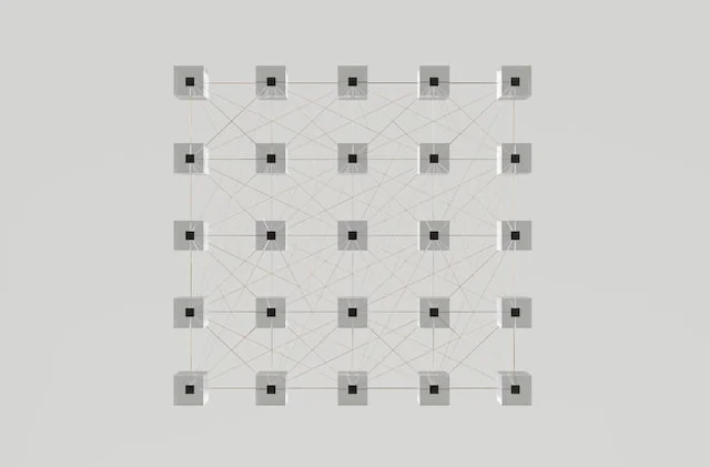 a white wall with squares and lines on it.